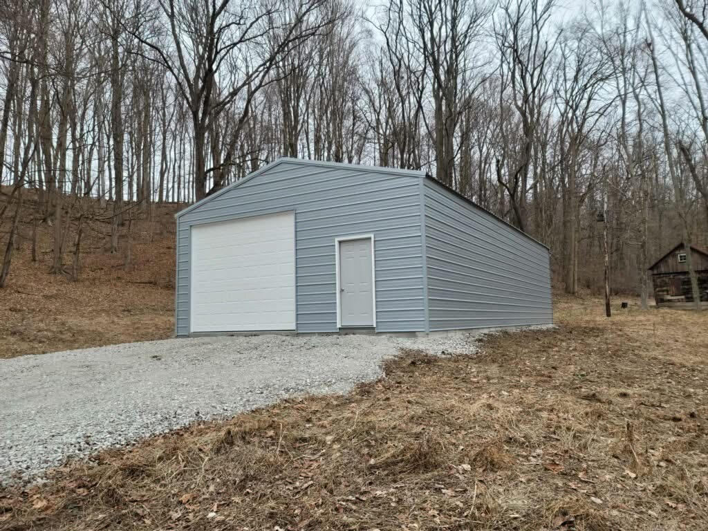 Custom red steel garage built in Western New York by Greg Builds